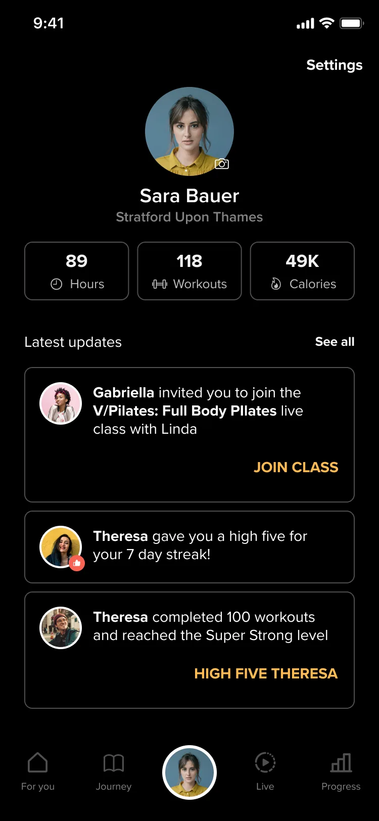 Test B profile screen with a Settings link and no back arrow, the member's photo, name and location, three stat tiles, the three latest updates with their actions, and the tab bar with the member's photo selected.